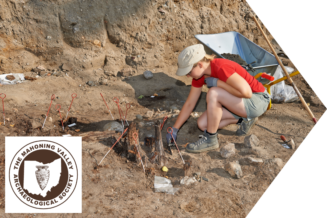 Woman kneeling and digging in the dirt searching for treasure.